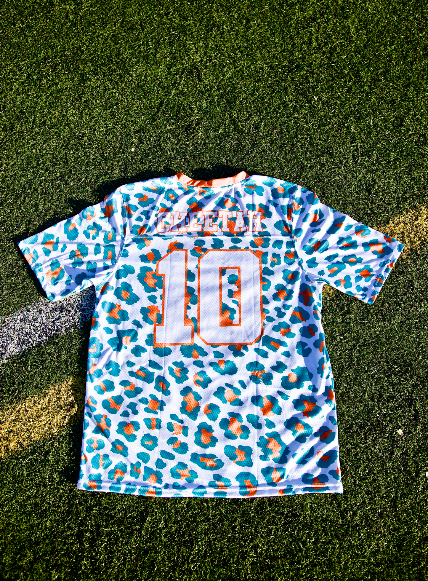 Cheetah Jersey White - Orange Neck